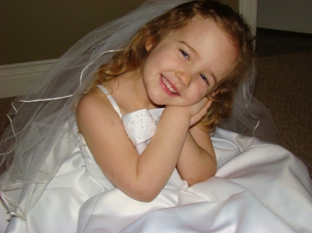 Playing dress-up in Mommy's wedding dress